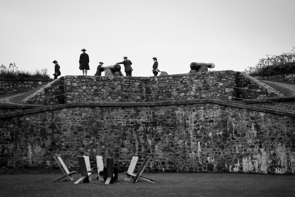 Costumed animators preparing for the firing of the canon. 